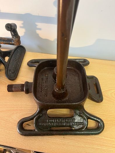Two vintage rain king cast iron sprinklers