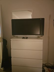 34" HD Flat Screen TV with remote and HDMI Lead.