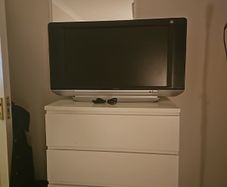 34" HD Flat Screen TV with remote and HDMI Lead.