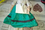 Vintage 1940s Papier Mache Doll, featuring a painted face on a soft fabric body,