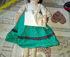 Vintage 1940s Papier Mache Doll, featuring a painted face on a soft fabric body,