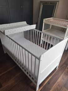 Cot bed with mattress and baby changer