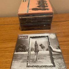 Oasis Cd Single Collection. Includes 2 Promotional onlys!