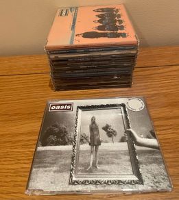 Oasis Cd Single Collection. Includes 2 Promotional onlys!
