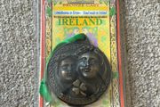 cold-cast bronze hanging medallion or ornament titled "Mother", handmade in Ireland