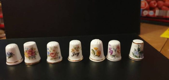 Collection of Flower Themed Gold Coloured Edged Thimbles