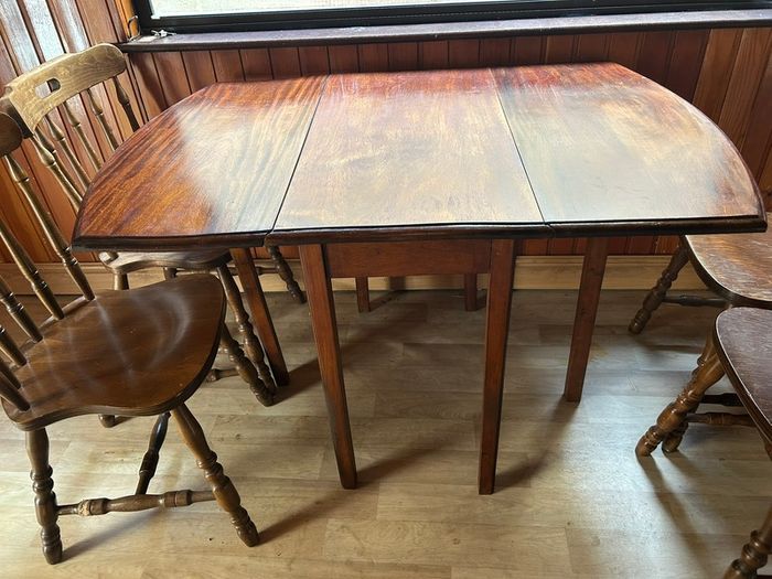 Wooden dining table and six chairs
