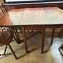 Wooden dining table and six chairs Image 4