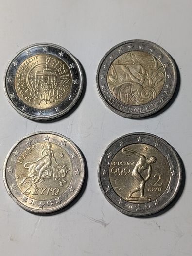 4 x Collectable 2 Euro coins.