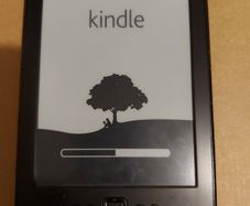 AMAZON KINDLE, Model D01100, Password Locked, in lovely leather protective case, in very good condition