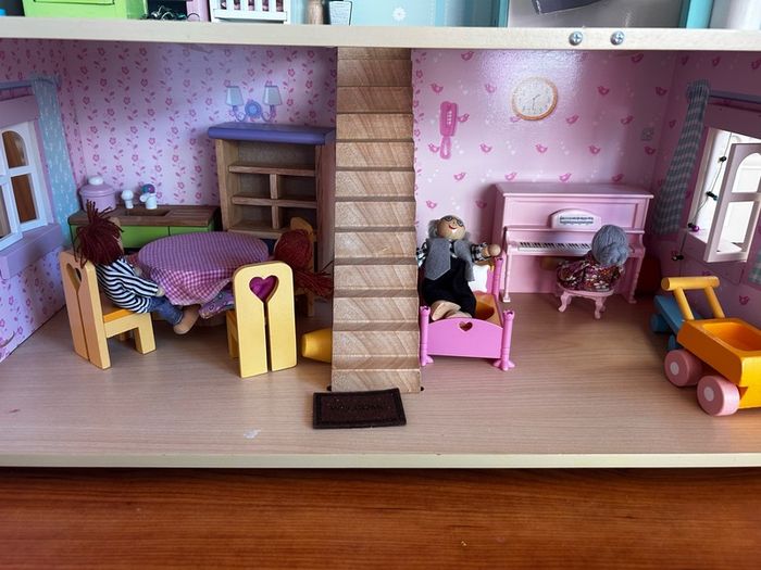Wooden dolls house with accessories