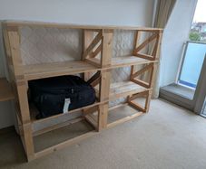 Convertible bed / shelves
