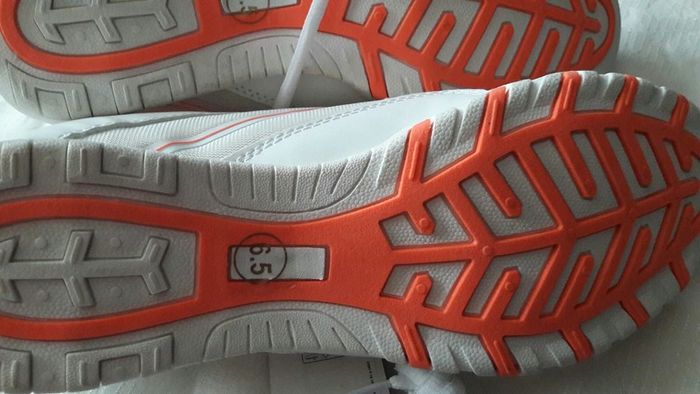 New white runners with tag