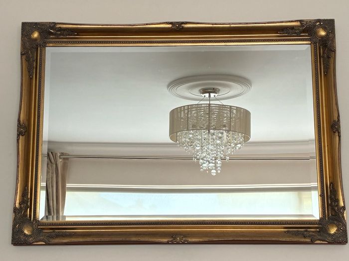Ornate antique overmantel mirror
