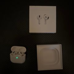 AirPods 4 with box
