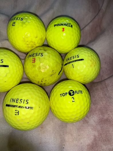 (7) Yellow colored golf ball
