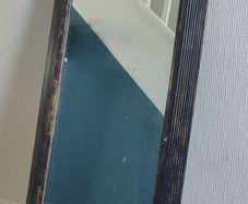 Wall Mirror with Brown frame.