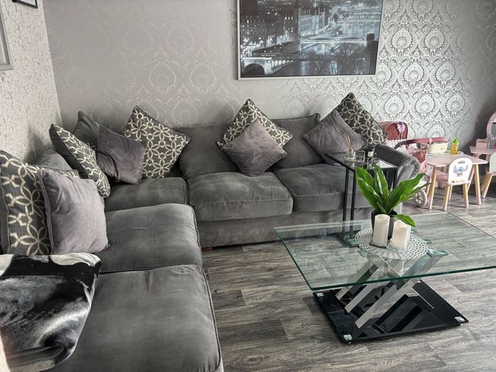corner sofa and pouffe