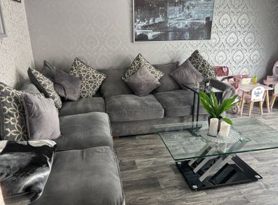 corner sofa and pouffe