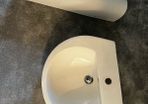 bathroom sink and pedestal