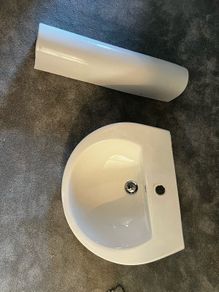 bathroom sink and pedestal