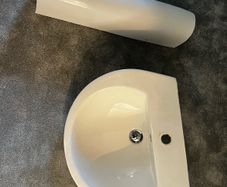 bathroom sink and pedestal