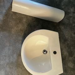 bathroom sink and pedestal