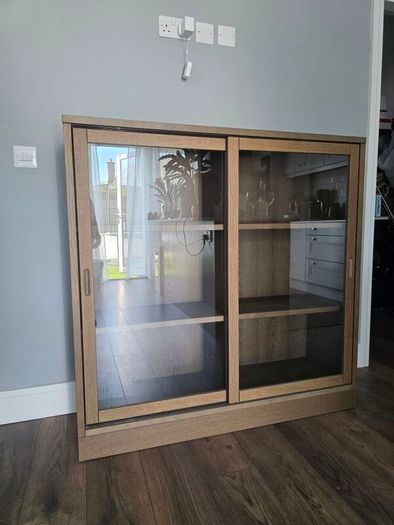 Ikea Cabinet with sliding glass doors, oak veneer 121x37x120 cm