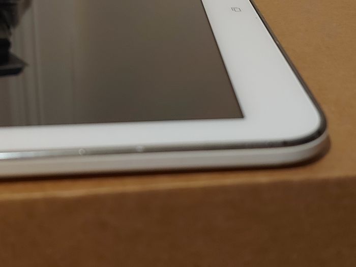 Samsung Galaxy Tab 4, Model SM-T530, 16GB, White, working great, in excellent condition and with a bunch of Family-children  movies