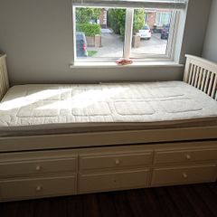 Single white pull out bed