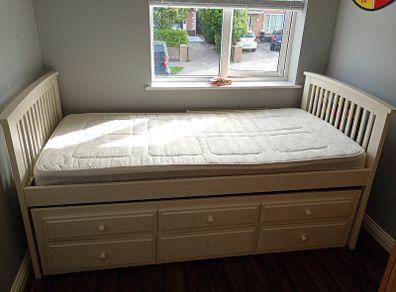 Single white pull out bed