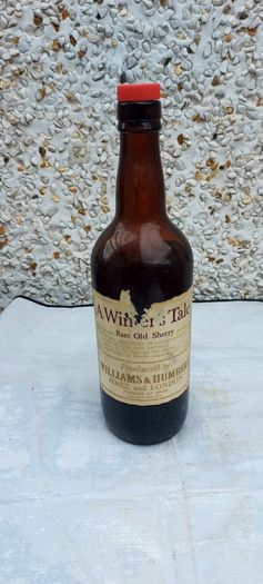 vintage bottle of winters tale sherry 3/4 full ,found in a old pub closed down,