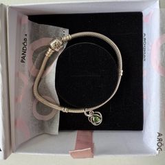 Brand new Pandora Moments Snake Chain Bracelet with green stone charm