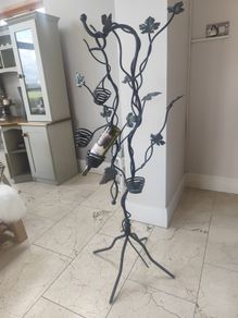 Wrought iron freestanding wine rack