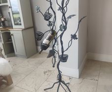 Wrought iron freestanding wine rack