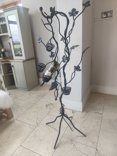 Wrought iron freestanding wine rack