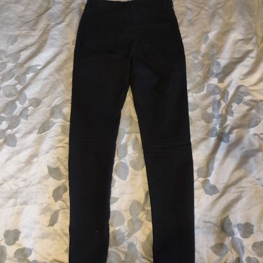 Black stretchy jeans with white stripes, size S, like new