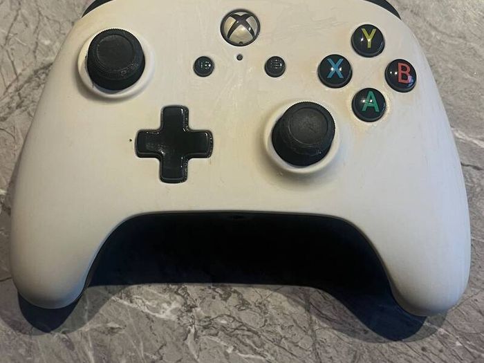 X-Box 1s with steering wheel and peddles