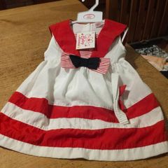 This is a Cutey Avenue brand 18-24 month red and white striped sailor-style dress. New with tags
