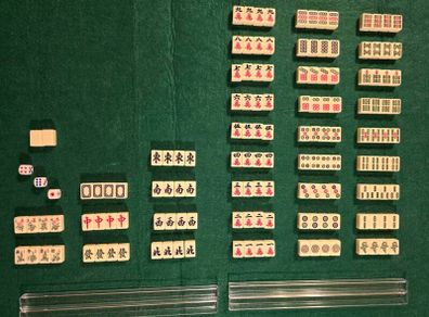 144 Mini Mahjong Set with 4 Title Racks and 2 Dice.