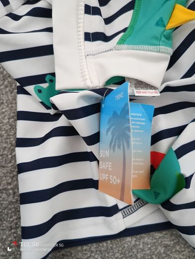NEW.NEXT boy's swim suit .age 5/6