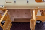 A yellow van from Sylvanian families