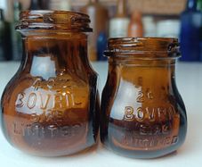 487 - Set of 2 Vintage Brown Amber Glass Screw Top Collectible Decorative Bovril Eire Bottles