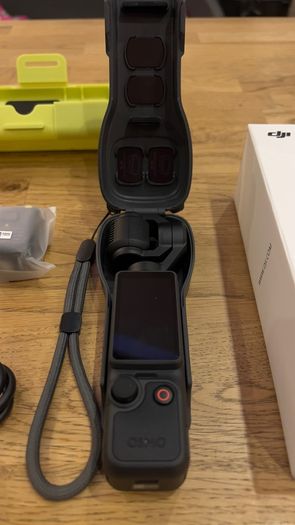DJI Osmo Pocket 4 gimbal camera, with many accessories