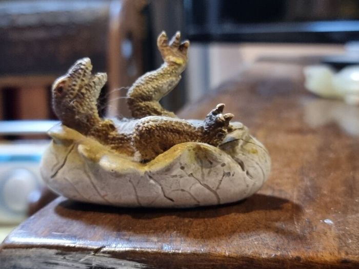 Hatching dinosaur toy figurine