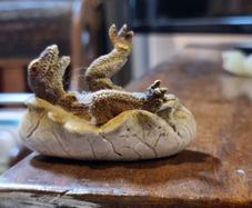 Hatching dinosaur toy figurine