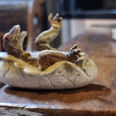 Hatching dinosaur toy figurine