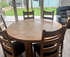Dining table with 6 matching chairs.