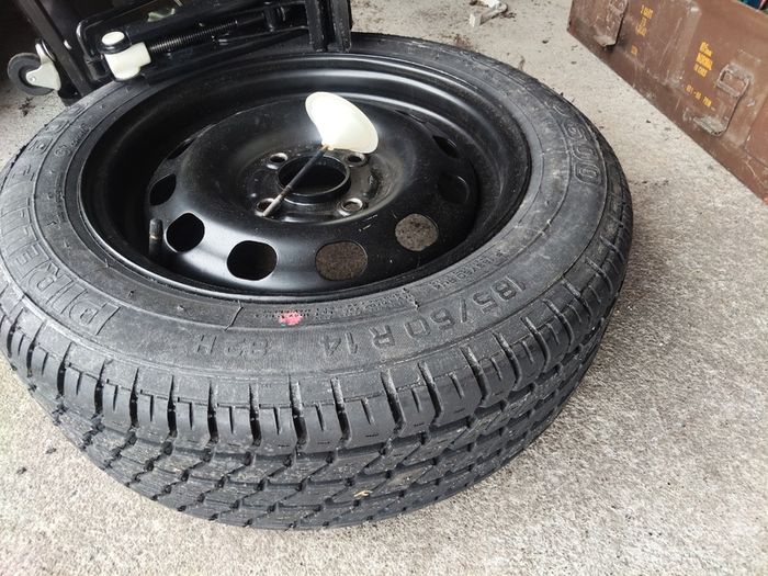 Ford Escort Mk6 steel rim and tyre, and original Jack.