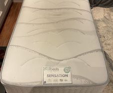 Single bed with headboard